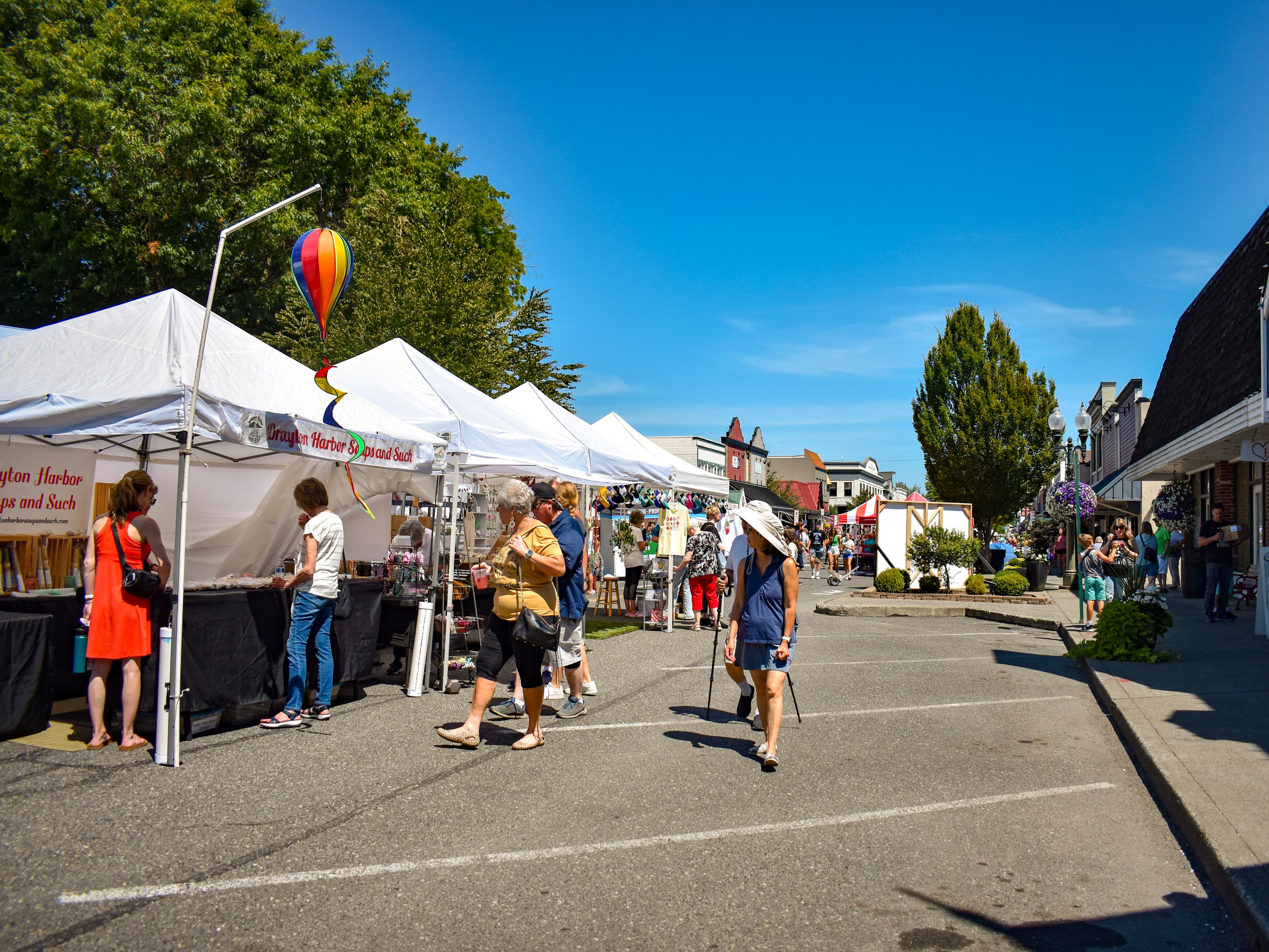 people walking in the street market